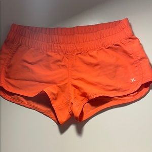 Hot Pink Hurley board shorts. Too small.